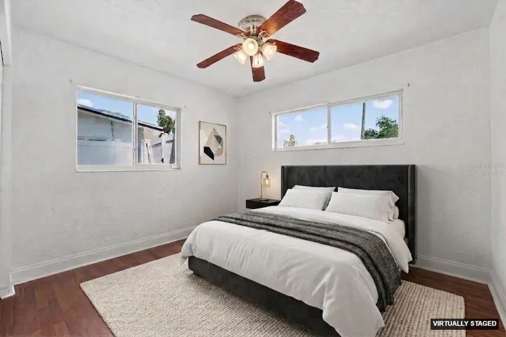 Virtually staged. Versatile bedroom space with natural light and closet storage