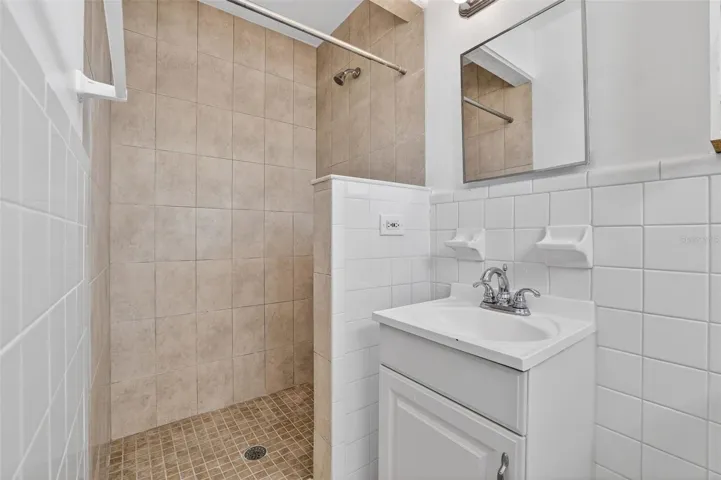 Private primary bathroom with walk-in shower