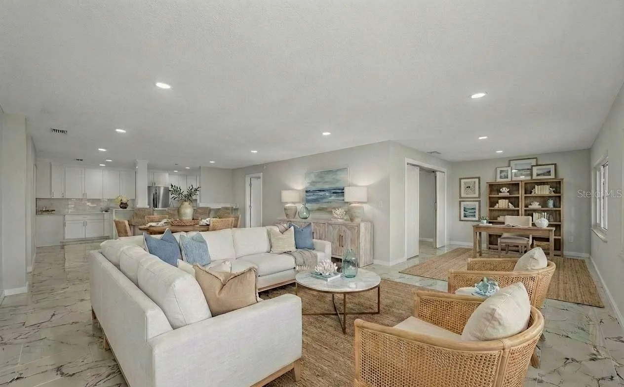 Virtual staged living/dining area with flex space