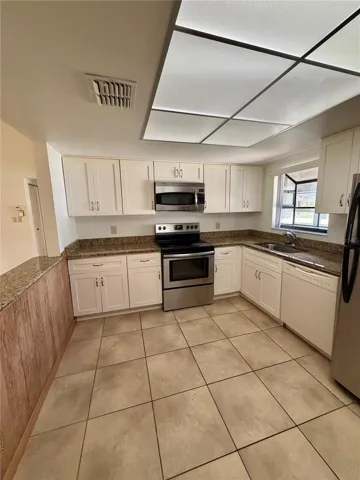 Updated kitchen with stainless steel appliances