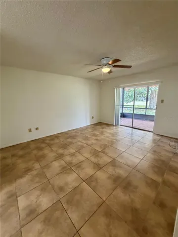 Dinning room with access to the covered screened in patio