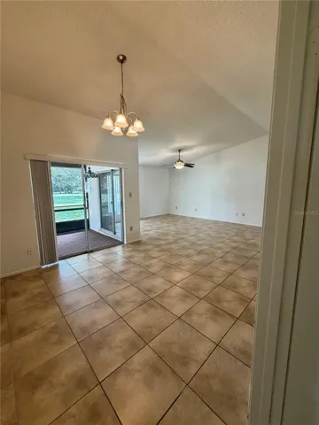 View from side kitchen of the dinning room and family room area