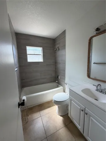 Full bath in the hallway between 2nd and 3rd bedroom, newly remodeled