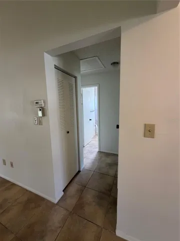 To the right are the 2 bedrooms and a full bath
