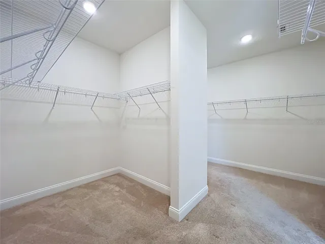 Generous his-and-her walk-in closets