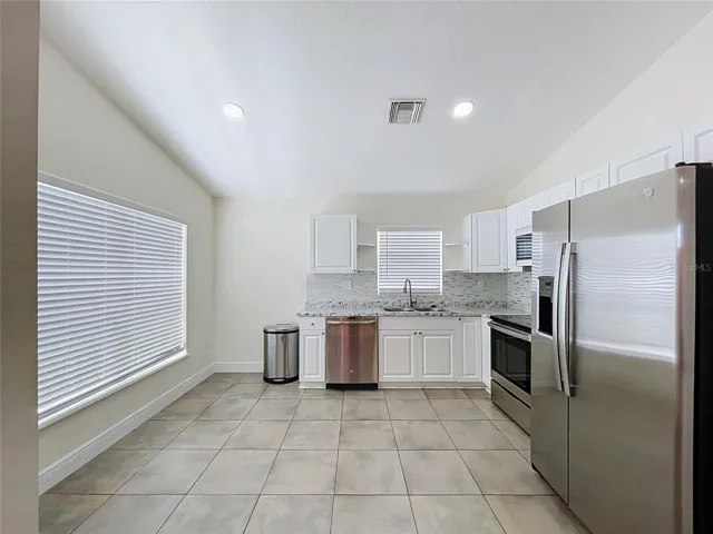 Kitchen Showing Area forTable and Culinary Preparation