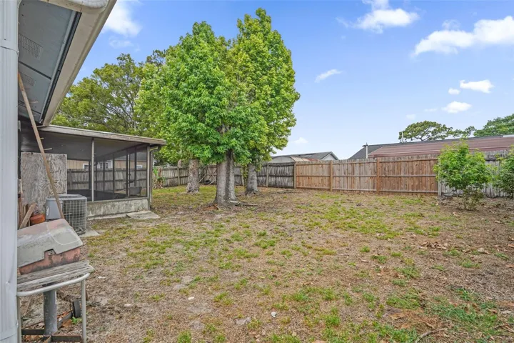 screened and covered patio in the back!