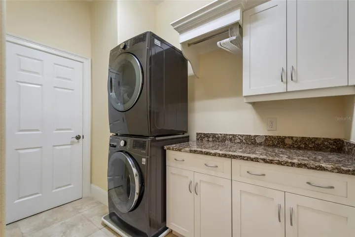 Upstairs laundry room! Yes, there are two laundry spaces and all washers and dryers convey with property.