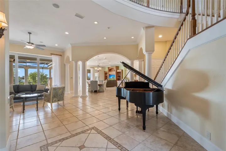 This open floor plan really showcases how grand this house is. Enter thru the magnificent foyer with cathedral ceilings.