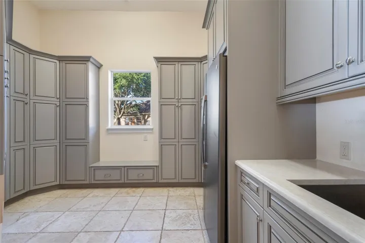 Oversized renovated mud room! No stone has been left unturned in this mudroom with the plentiful storage.