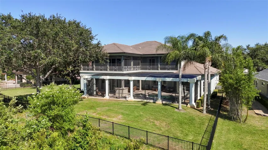 Large backyard and side yard. Mature landscaping. This is a lakefront estate that can be enjoyed for years to come!