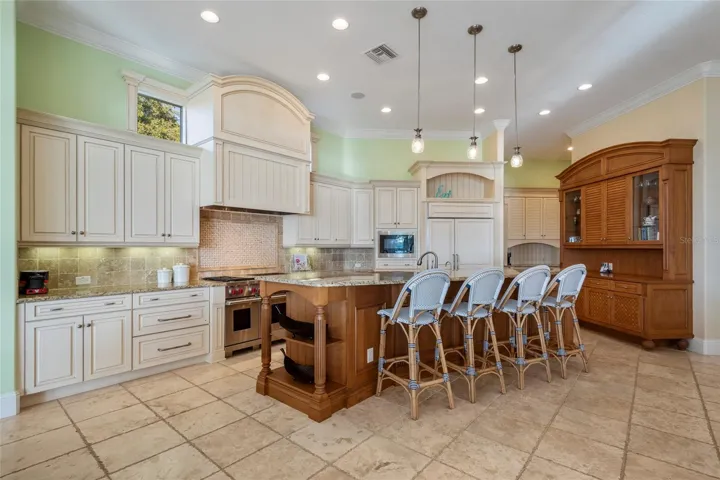 The cabinetry is very high end quality. This is a chef's kitchen's dream! Wolff appliances, two dishwashers, warming drawer, etc