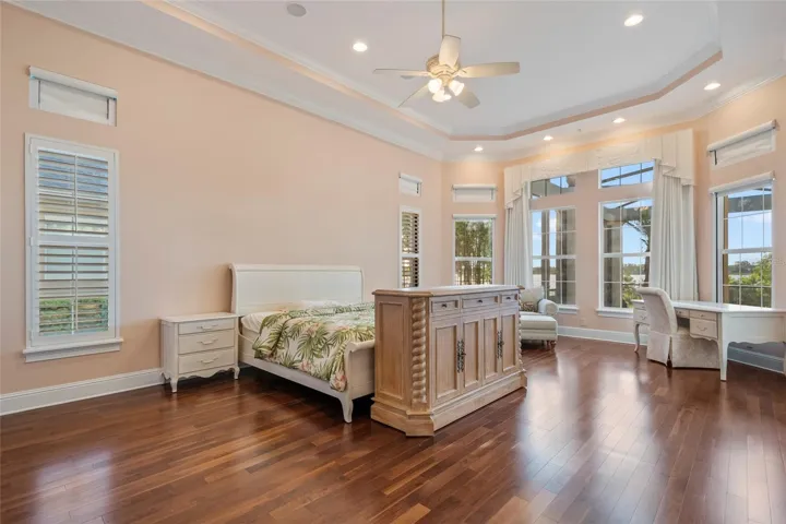 Owner's Retreat is downstairs. Lake views! Plantation shutters and wood floors