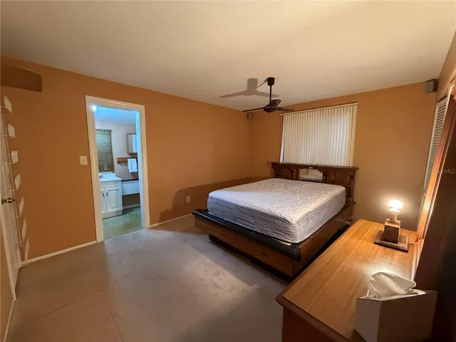 Primary Bedroom with En Suite Bath to Exterior, Dual Closets, Ceiling Fan