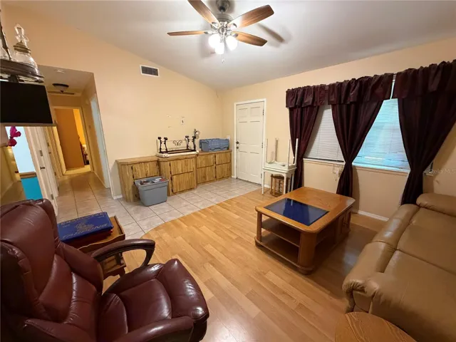 Living Room with Ceiling Fan, Vaulted Ceiling