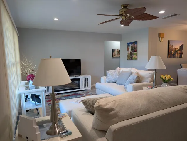 Another view of Living room from front entry to hallway.