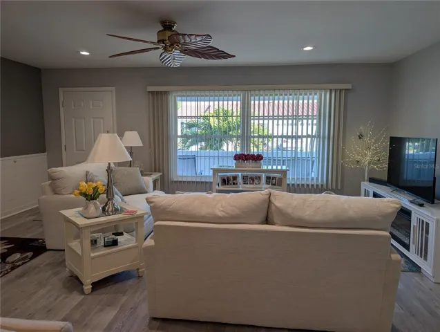 View of living room to front entry.