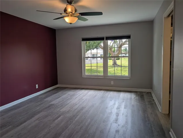 View of primary suite with new ceiling fan (2026).