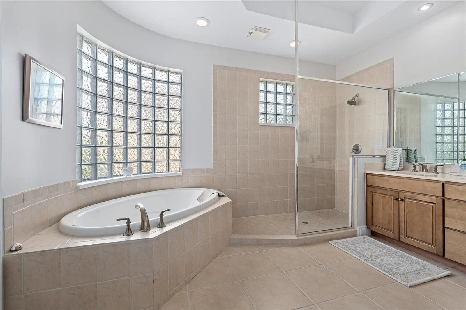 Master bath with tub and shower