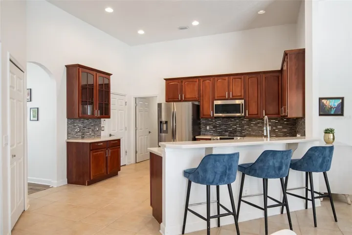 KITCHEN LEADS INTO LIVINGROOM AND DINING ROOM