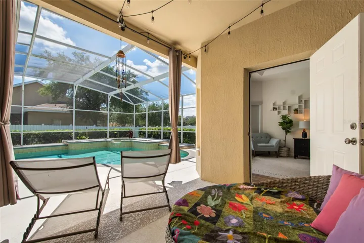 POOL ENTRY FROM PRIMARY BEDROOM &amp; FAMILY ROOM