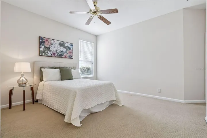 13' x 12' Bedroom #2 w/ walk-in closet & a ceiling fan