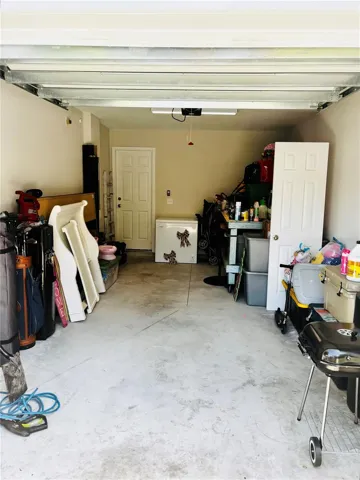 Looking into the garage from the driveway