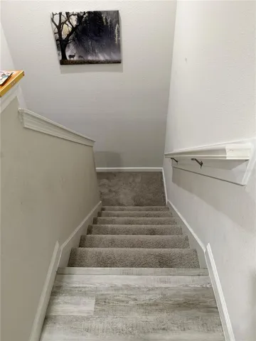 Looking down the stairs from the second floor