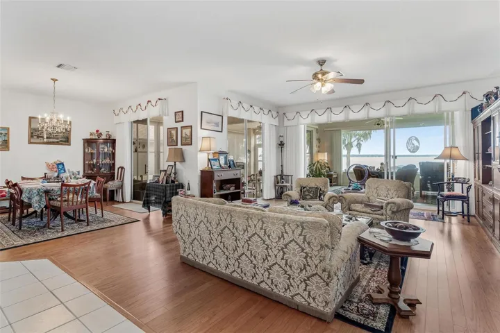 LIVING ROOM WITH LAMINATE WOOD FLOORING