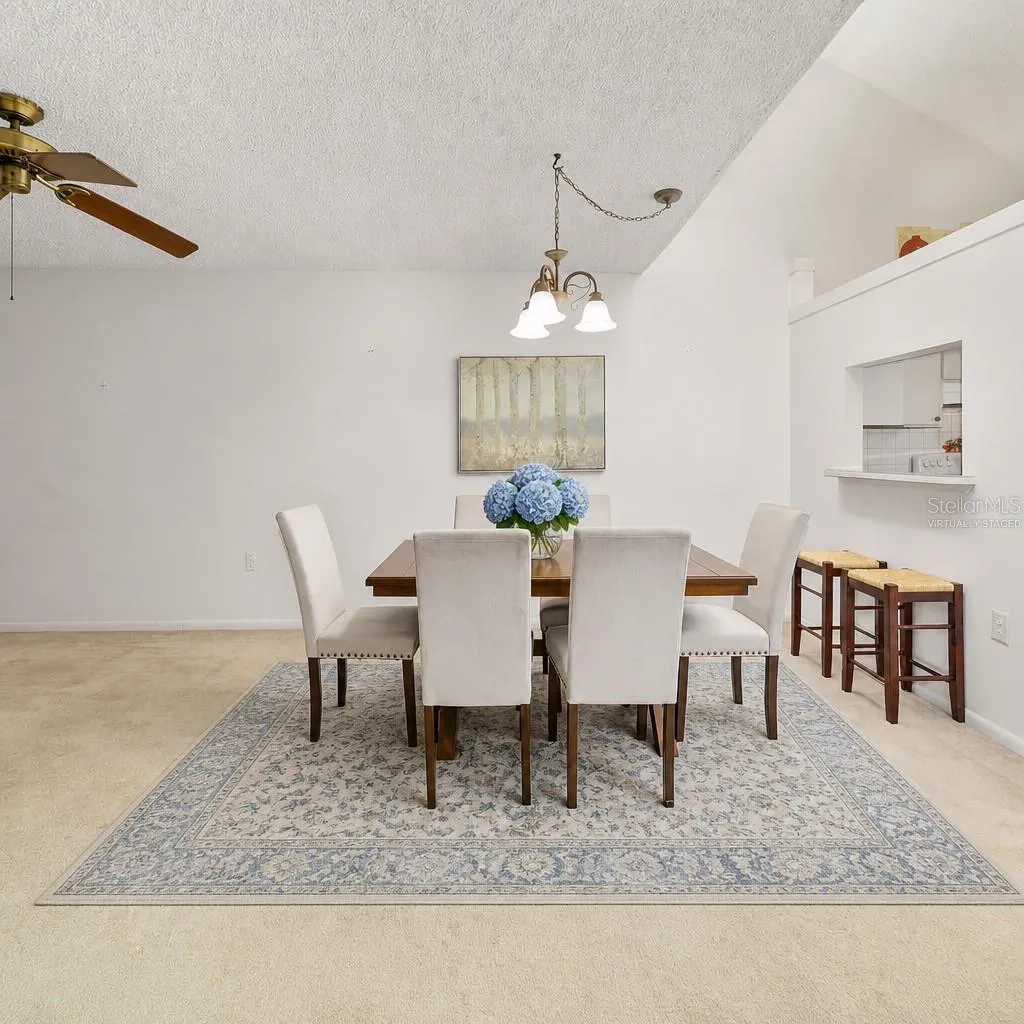 Dining area large enough for full table and 2 barstools(Partially virtually staged