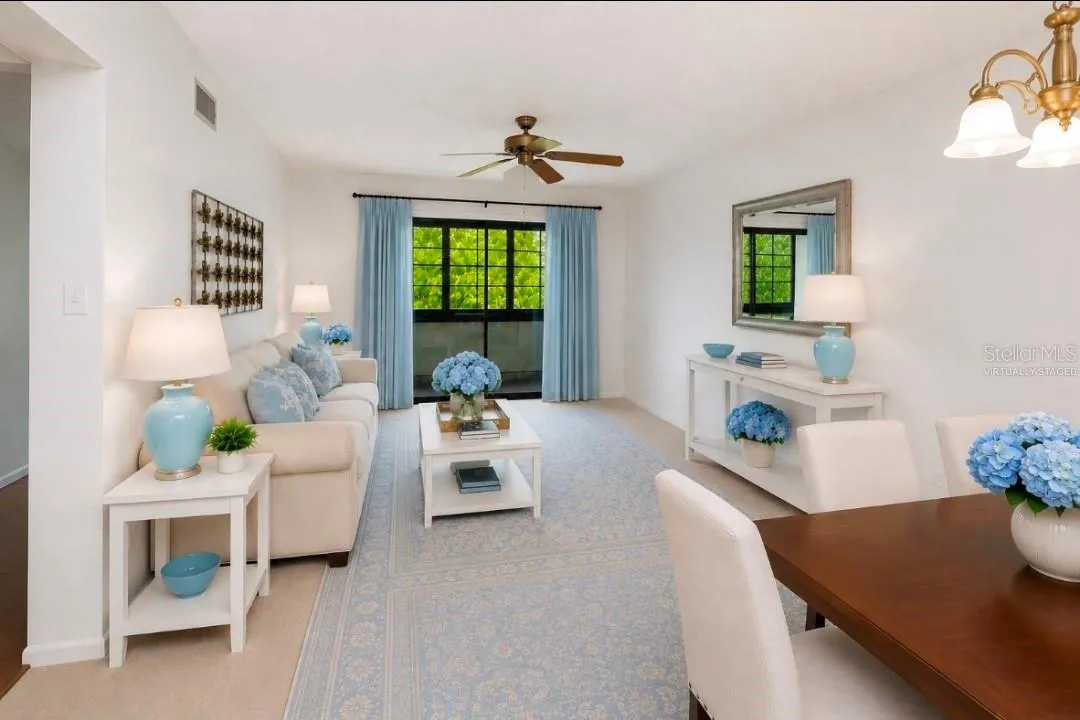 Dining room looking to living room and Lanai(Partially virtually staged