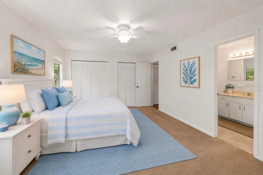Primary bedroom, view to private bathroom(Partially virtually staged
