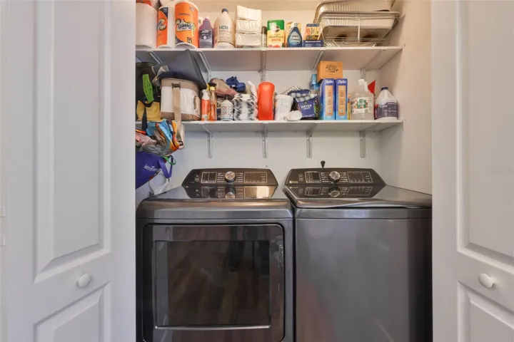 Washer/Dryer in closet near Kitchen