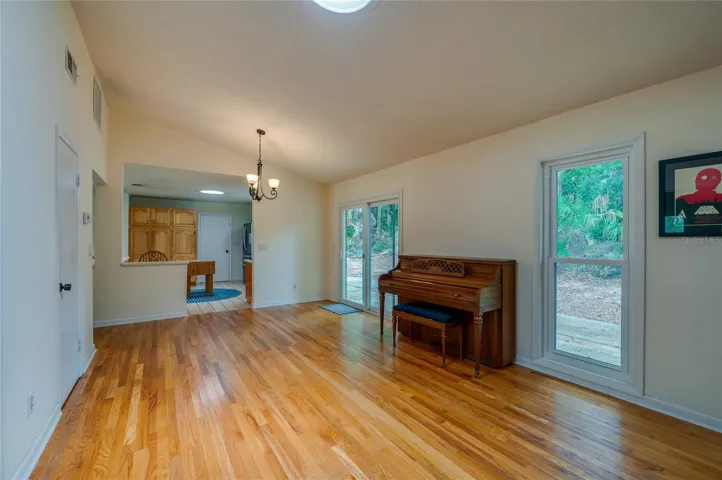 Breakfast area and living room to kitchen