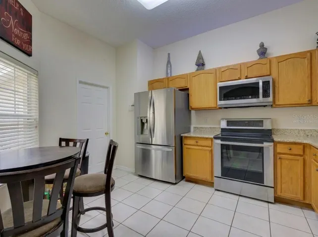 Kitchen and dining virtually staged