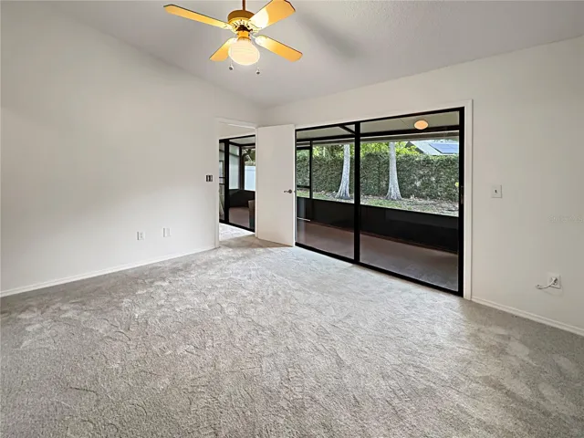 Primary bedroom with direct access to patio