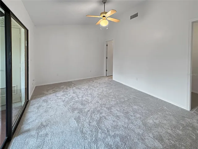 Primary bedroom with en-suite bathroom and walk-in closet