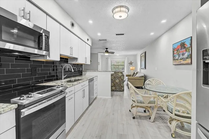 Granite counter tops with Stainless appliances