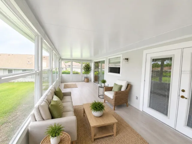 Virtually staged. Covered lanai outdoor living area. OM724494