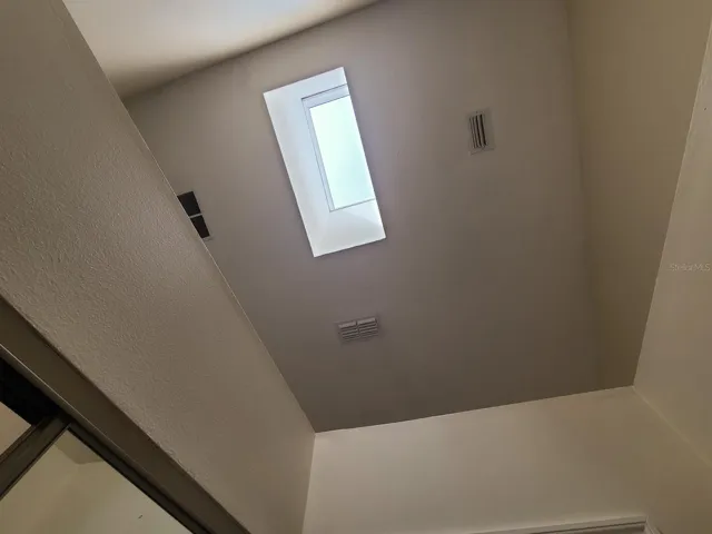 Primary bathroom with natural skylight lighting. OM724494