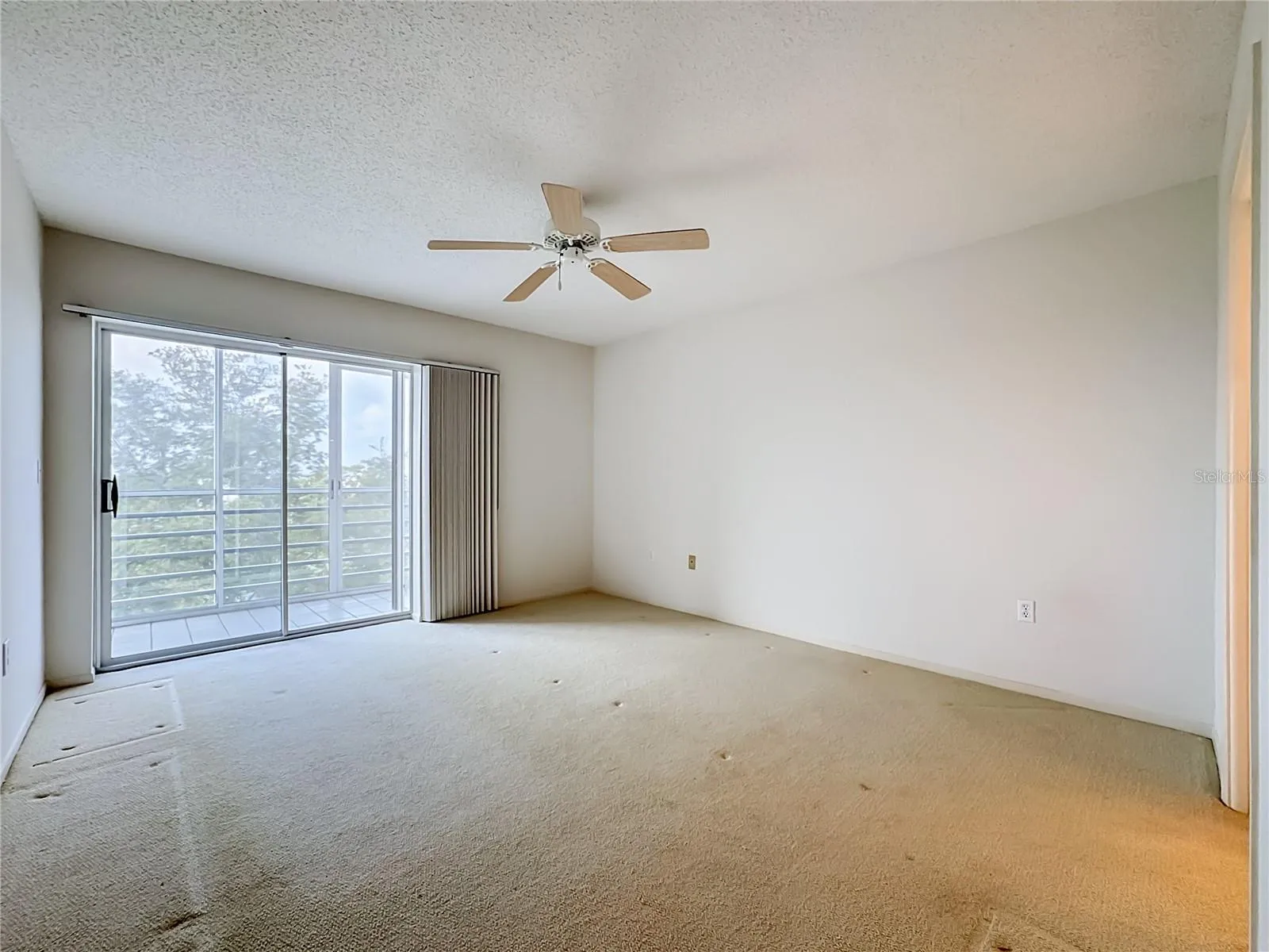 Primary bedroom with its own glass enclosed lanai.