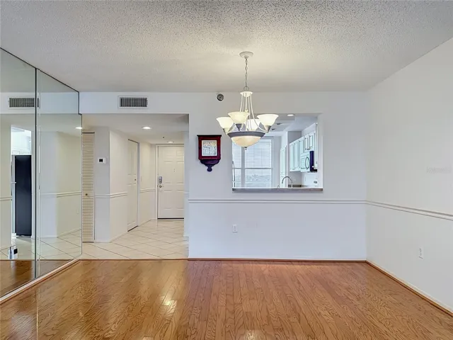 Dining room with pass-through to kitchen.