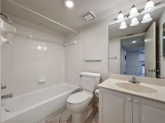 Guest bathroom with tub/shower combination.