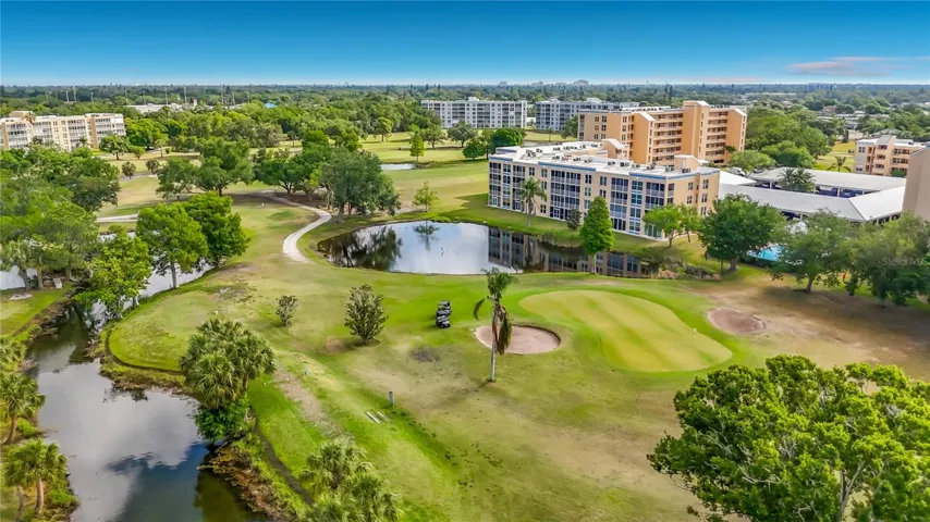 Aerial view of the golf course and back of the building.