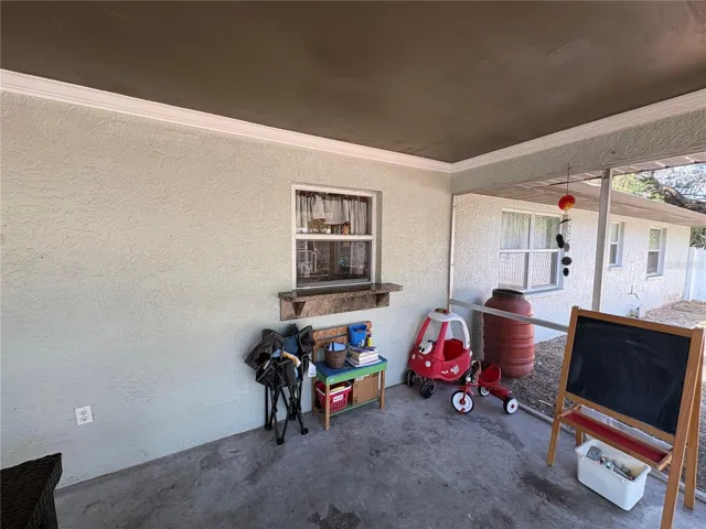 VIEW FRONT DOOR OF LANAI TO PASS THROUGH WINDOW