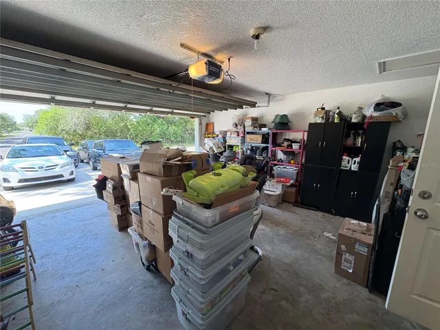 VIEW FROM GARAGE ENTRY DOOR TO OUTSIDE