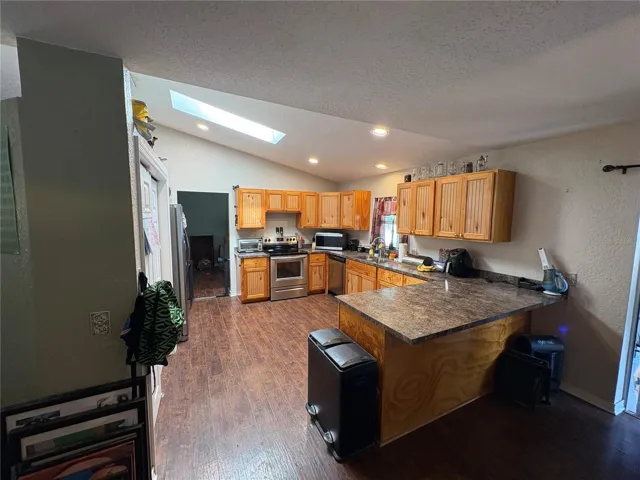 KITCHEN VIEW FROM EAT IN DINING AREA