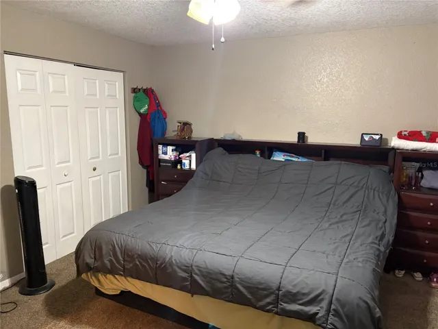 PRIMARY BED VIEW FROM BATHROOM