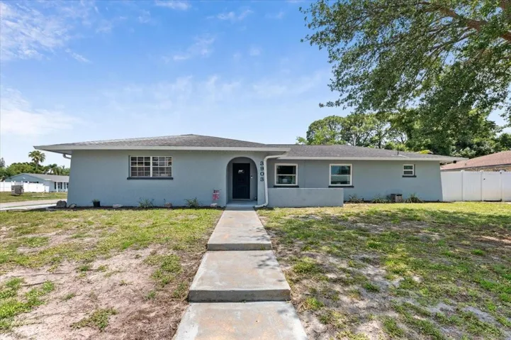 Front of the home, with a side load garage.