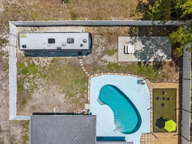 12 ft double gates help accommodate parking your toys.